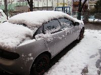 車に積った雪
